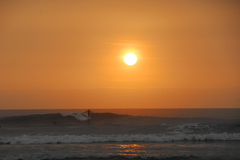 Cathing the last waves of the evening in Huanchaco.